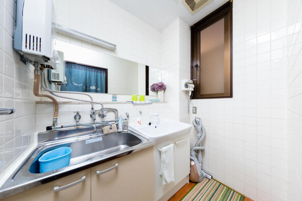 Yolee Guest House Izumisano Buitenkant foto